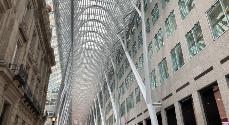 The vibrant Brookfield Place Galleria in Toronto, with natural light streaming through the freshly cleaned glass ceiling after a thorough window cleaning